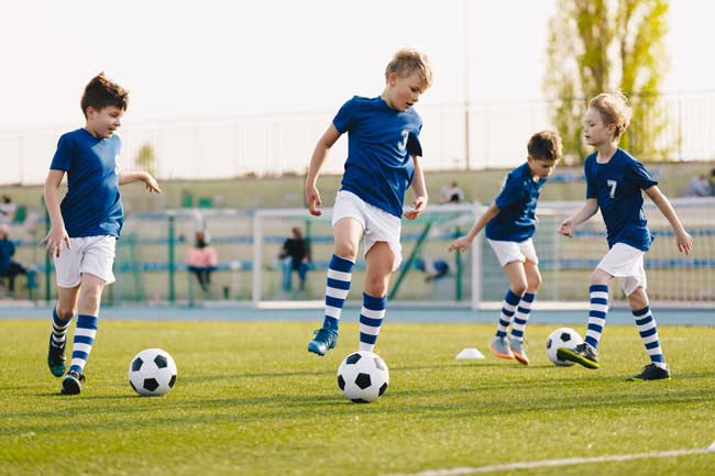 Athletes playing soccer